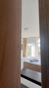 Aliona Santorini Drymades, Dhermi