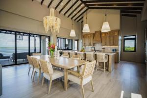 NEW 3 Story Waterfront 4Bedroom Villa with Amazing Sunset Mountain Views