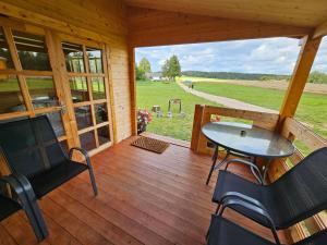 Atpūta Priedītēs - koka namiņi pie Tērvetes Dabas parka ar zirgiem, ponijiem un dabas tuvumu