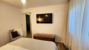 Apartamento com elevador e vaga no Cônego