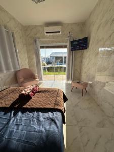 Casa com Piscina,Area gourmet,3 quartos,espaço Kids