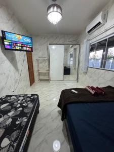 Casa com Piscina,Area gourmet,3 quartos,espaço Kids