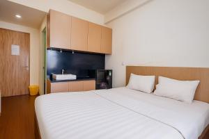 Quintessa Room at Candiland Apartment