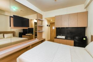 Quintessa Room at Candiland Apartment