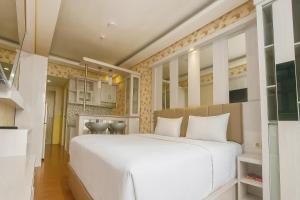 Quintessa Room at Candiland Apartment