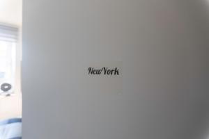 Chambre New York à Liège Moderne avec salle de bain privée spacieuse, check in autonome, 2eme etage