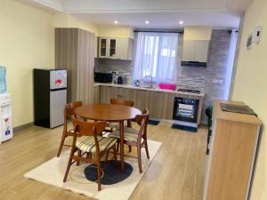 metro living retreat apartment with heated swimming pool,fully equipped gym ,ample parking space and a relaxing rooftop with breathtaking views