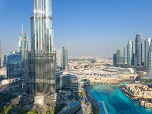 GRANDE RESIDENCES with a direct Burj Khalifa view and Private Fountain Show at 62nd floor with DXB AIRPORT VIP Shuttle option for 8 guests