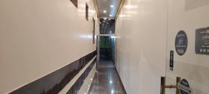 M-Hotel Aman Residency Ops- Quest Mall Near park circus Seven point crossing