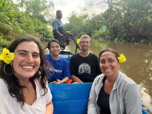 Dorm bed in center with balcony, rooftop and floating market tour since 2025