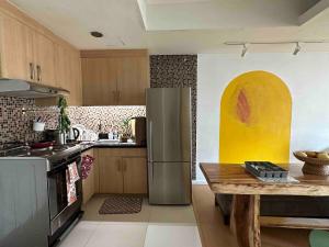 Cozy House BGC 1BR up to 6 Guests 100MBPS WiFi