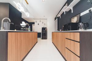 Wooden Sand MosaicSouthkey 3BR w bathtub Midvalley by Our Stay
