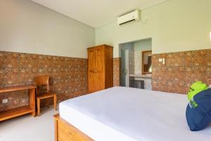 Urbanview Asung 2 Guesthouse near Canggu