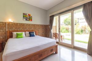 Urbanview Asung 2 Guesthouse near Canggu