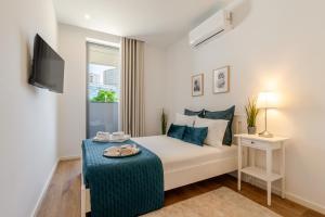 Sleek & Modern Flat w Private Garage by HostWise