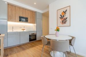 Sleek & Modern Flat w Private Garage by HostWise