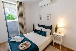 Sleek & Modern Flat w Private Garage by HostWise