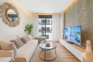 NEW stylish beachside 2BR with pool and garage