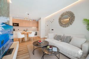 NEW stylish beachside 2BR with pool and garage