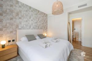 NEW stylish beachside 2BR with pool and garage