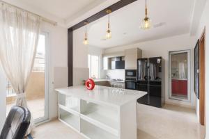 Skyline Haven by Red Olive4BHK30mins Airport