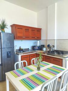 Beachside Apartment with Ocean View, Garden and 2 Swimming Pools