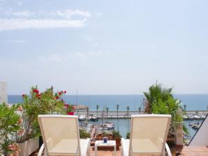Stunning sea views over marina with swimming pool