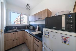 Studio rénové avec grande terrasse - Climatisation - Aperçu mer