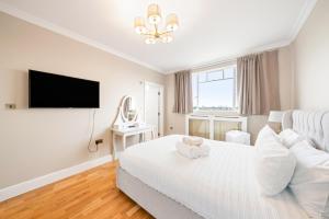 Upscale Comfort 3 Beds over Harrods Residence
