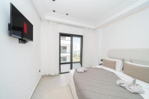 HIGH STANDING Apartment - IPTV - AC - Easy Parking - Cosy stay