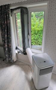 Suite familiale avec 2 Chambres dans une villa - quartier vert et boisé - 5 kms de Namur