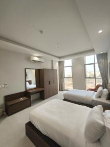 Muscat City Stay-2BR Apt 108 near Grand & Avenue Mall