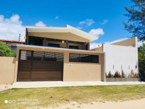 Casa luxo beira mar 5 qtos e piscina