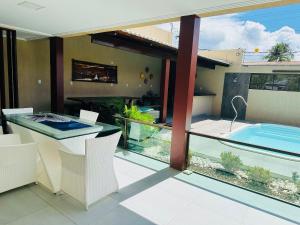 Casa luxo beira mar 5 qtos e piscina