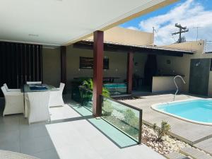 Casa luxo beira mar 5 qtos e piscina