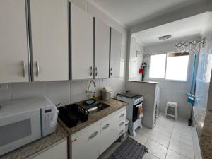 Apto completo pé na areia garagem coberta