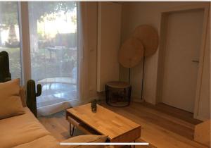 Petit cocon lillois:Cheminée & jardin