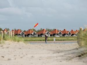 8 person holiday home on a holiday park in Bogense