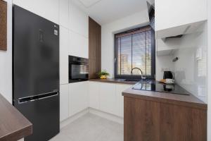 Air-conditioned Apartment with Parking in Warsaw near PGE Narodowy