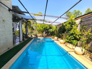 פינת נופש- סויטת הרימון עם בריכה משותפת