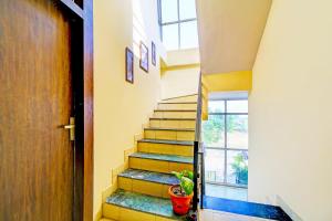 Hotel O by OYO The Happy Land Hotel & Cafe