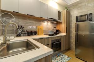 beautiful two bedroom apartment with heated swimming pool fully equipped gym ample parking space and relaxing rooftop with breathtaking city views