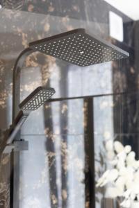 Chambre de luxe Afrik a Liège Grande Sale de bain privée check in autonome cuisine partagée