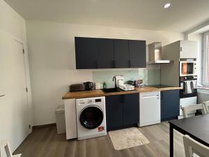 Chambre de luxe Afrik a Liège Grande Sale de bain privée check in autonome cuisine partagée