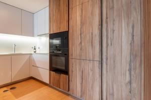 Premium Apartment w Garage & Balcony by HostWise