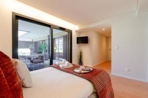 Premium Apartment w Garage & Balcony by HostWise