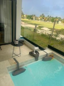 apartment in Punta Cana near beach with private balcony and pool