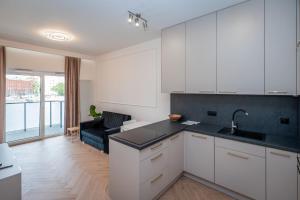 Bulwary nad Odrą Apartments z widokiem na rzekę Odrę i prywatnym miejscem parkingowym