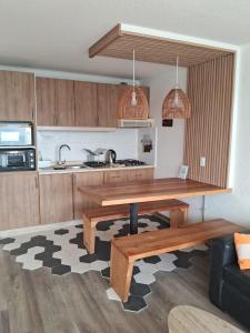 Departamento frente al mar, con piscinas y vista panorámica