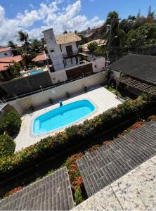 Aconchegante Casa Triplex perto Praia com Piscina